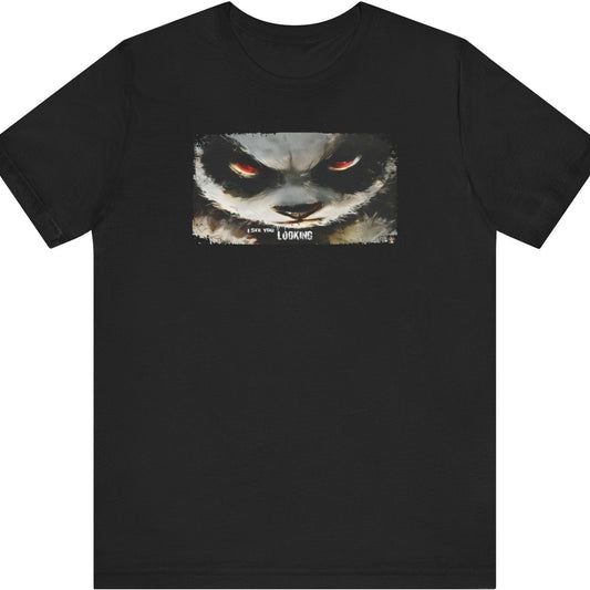Fat Belly Panda™ “I See You Looking” unisex tee for men and women — extreme close-up panda face with head tilted down and eyes looking up, sumi-ink watercolor style, playful Too Cute to Behave design on black background.