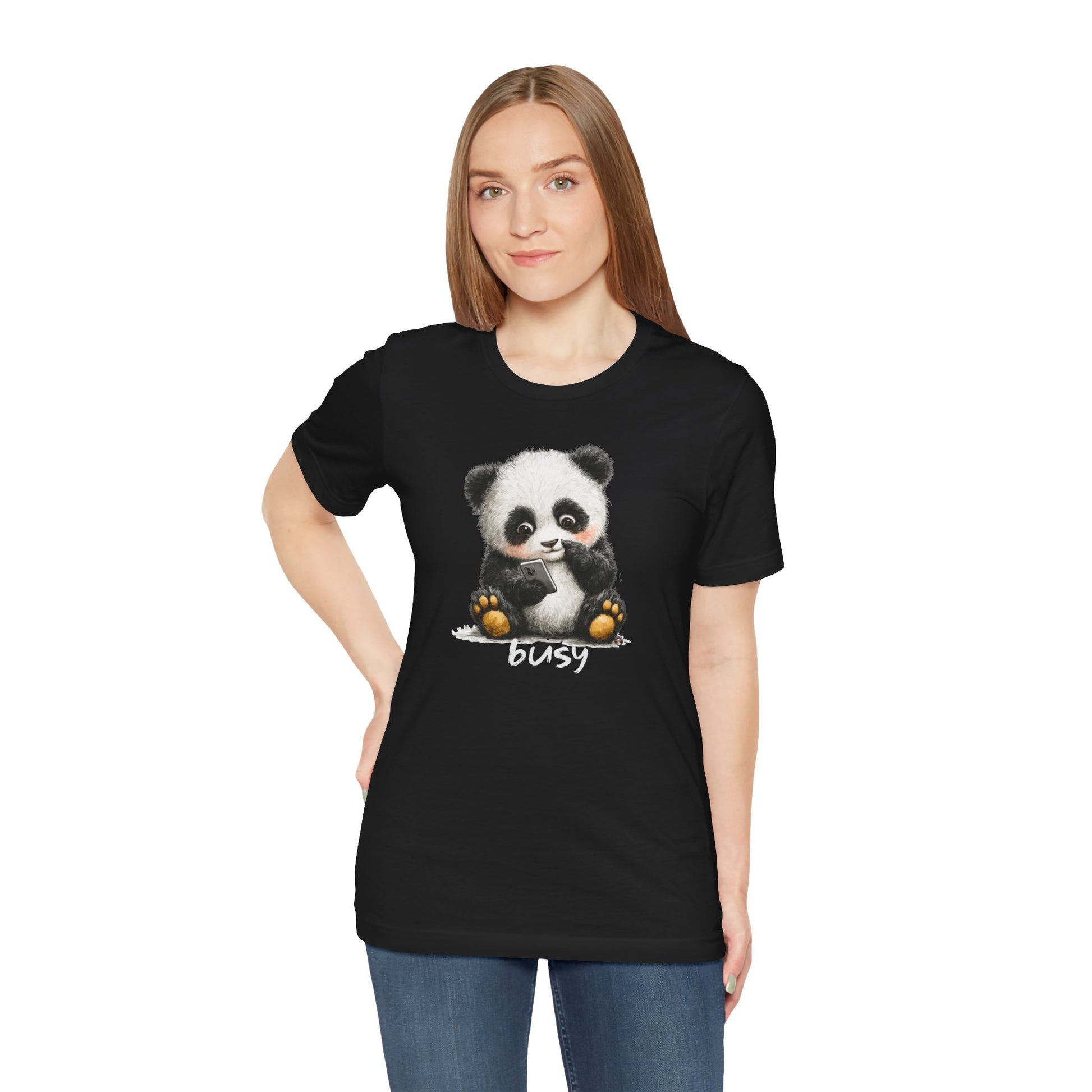 Woman wearing Fat Belly Panda “Busy (phone)” unisex tee for men and women — cheeky panda ignoring calls, playful Too Cute to Behave design on black background.